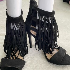 High heeled fringed sandals. Faux suede